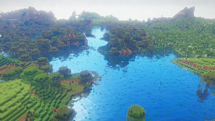 Una captura de pantalla de Minecraft de un paisaje con los Shaders de Oceano activados.