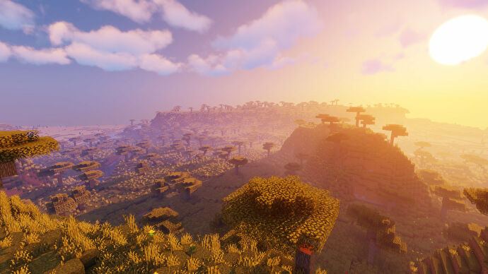 Una captura de pantalla de Minecraft de un paisaje con los sombreadores vibrantes de Sildur activados.