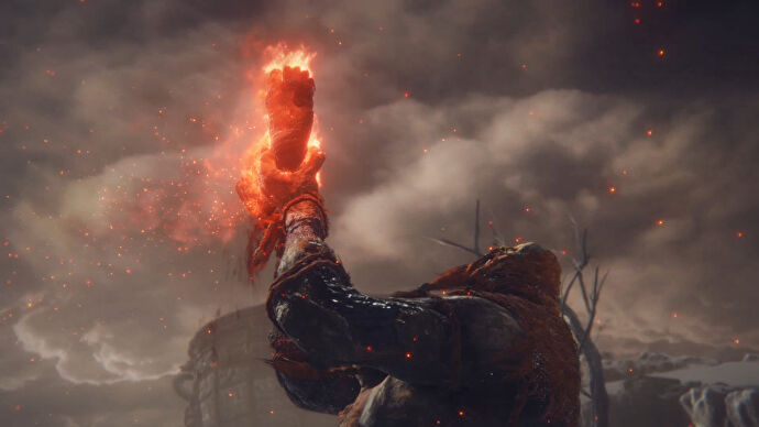 Captura de pantalla de una escena en el Anillo de Elden: el Gigante de Fuego levanta su propia pierna cortada en llamas con un rugido.